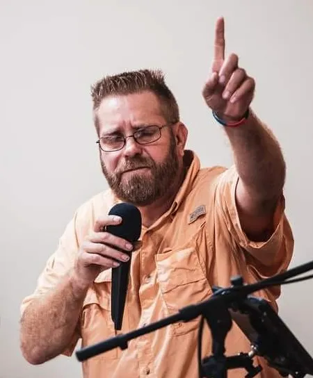 Pastor Troy Allen Pederson speaking at a ministry event Pastor Troy Allen Pederson - Brotherly Love Recovery Farm